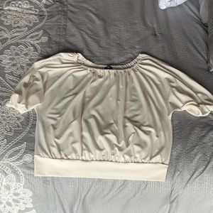 Express size Medium cream top. So cute and comfortable.